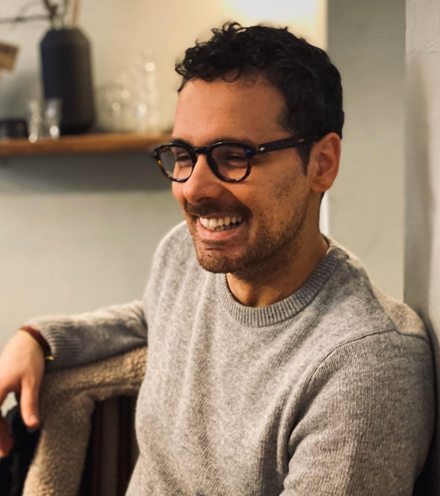 Federico Sferrazza, founder of Sferrazza Method, standing in a light studio